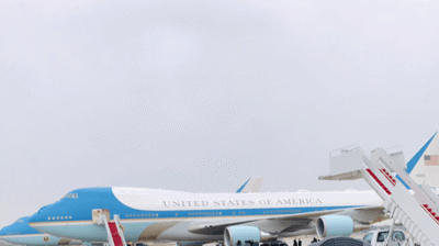 Mr. Omar Siddiqui on the tarmac with President Donald J. Trump Photo
